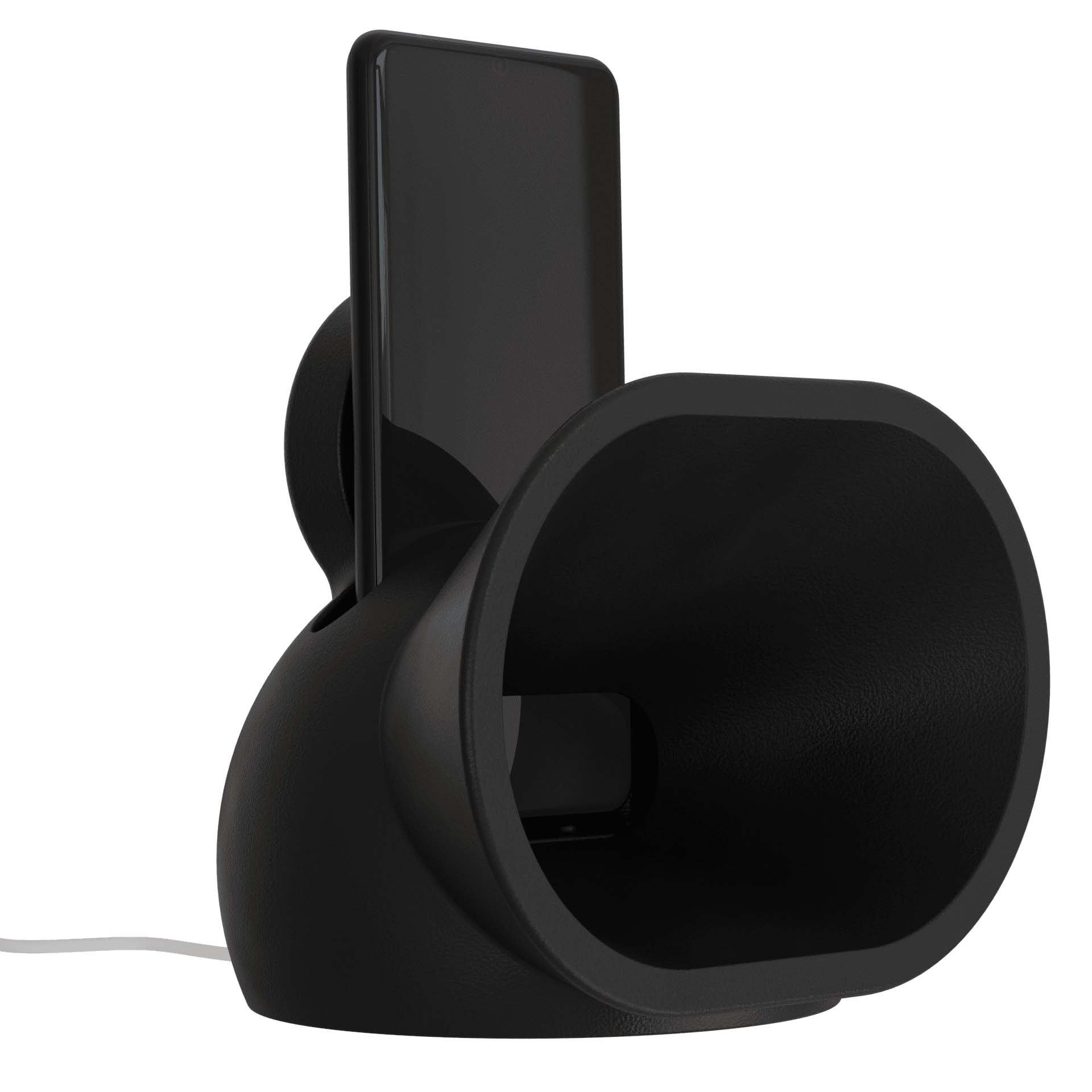 Amplificador acústico portátil, projetado para smartphones, com um design moderno e funcional. Feito de resina durável, ele utiliza uma estrutura em formato de corneta para amplificar o som do aparelho de forma natural, sem a necessidade de energia elétrica ou baterias. Seu design compacto e minimalista, na cor preta, combina estilo e praticidade, sendo ideal para uso em ambientes internos ou externos. Além de amplificar o som, também funciona como carregador por indução.